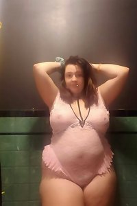 Plump, sensual doll posing temptingly in lingerie