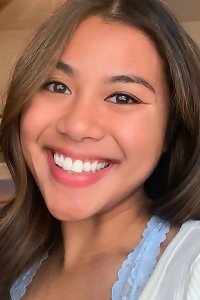 curvaceous lady lightly fumbling her body with a sensual sight on her face