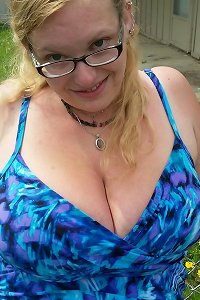 round nymph vigorously pleasuring herself with magic wand